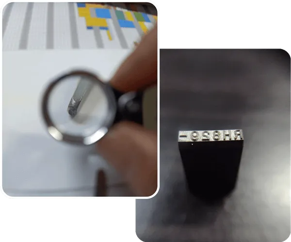 Inspecting a stamped tooling component under a magnifying loupe