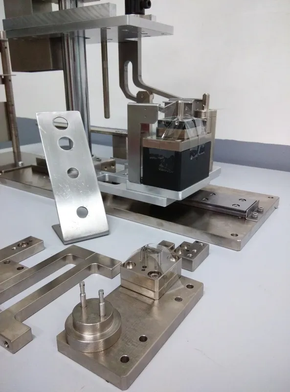 Custom jig and fixture assembly built from precision-machined stainless components